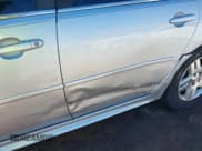 ✅ 2014 Chevrolet Impala LT • VIN: 2G1WB5E35E1114228 • Lot: 43336030. Listed on IAAI with 123,218 mi. Free auction sales archive from the USA and detailed vehicle history report at DreamBid. Image 6.