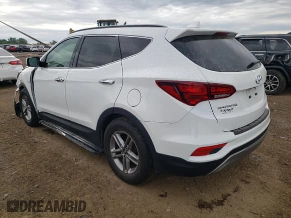 ✅ 2018 Hyundai Santa Fe 2.4L • VIN: 5NMZU3LB8JH069899 • Лот: 60903774. Опубликован ранее на Copart с пробегом 44 666 миль. Бесплатный доступ к архиву аукционных продаж из США и подробный отчёт об истории автомобиля на DreamBid. Изображение 2.
