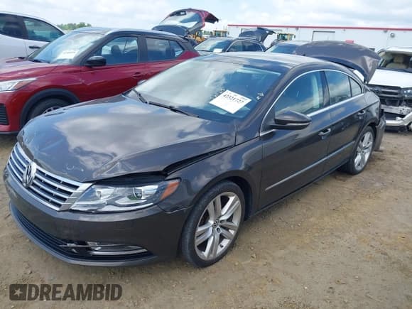✅ 2015 Volkswagen CC Executive • VIN: WVWRP7AN7FE802238 • Lot: 42321727. Wystawiony na IAAI z przebiegiem 65 933 mil. Bezpłatny archiwum sprzedaży aukcyjnych z USA i szczegółowy raport historii pojazdu na DreamBid. Zdjęcie 2.
