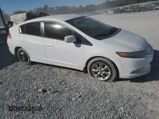 ✅ 2010 Honda Insight EX • VIN: JHMZE2H70AS024969 • Лот: 87423905. Опубликован ранее на Copart с пробегом 153 589 миль. Бесплатный доступ к архиву аукционных продаж из США и подробный отчёт об истории автомобиля на DreamBid. Изображение 4.