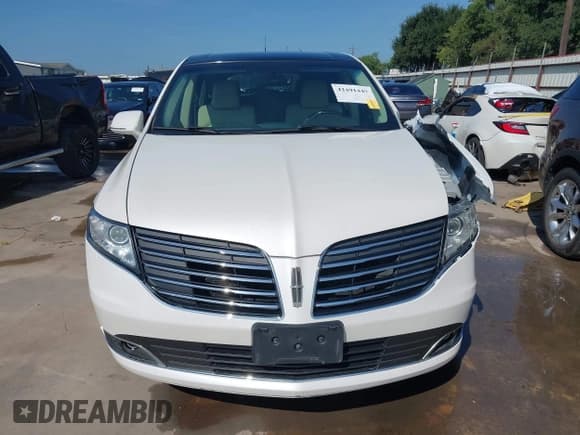 ✅ 2019 Lincoln MKT Reserve • VIN: 2LMHJ5AT1KBL03571 • Лот: 42491449. Опубликован ранее на IAAI с пробегом 81 628 миль. Бесплатный доступ к архиву аукционных продаж из США и подробный отчёт об истории автомобиля на DreamBid. Изображение 13.