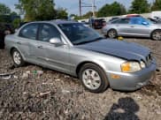 ✅ 2004 Kia Optima LX • VIN: KNAGD126945355457 • Lot: 74191244. Wystawiony na Copart z przebiegiem 109 378 mil. Bezpłatny archiwum sprzedaży aukcyjnych z USA i szczegółowy raport historii pojazdu na DreamBid. Zdjęcie 4.