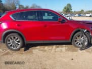 ✅ 2021 Mazda CX-5 Grand Touring • VIN: JM3KFADM9M0300787 • Lot: 41231871. Listed on IAAI with 54,474 mi. Free auction sales archive from the USA and detailed vehicle history report at DreamBid. Image 13.