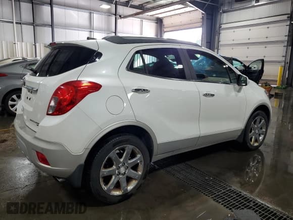 ✅ 2014 Buick Encore Premium • VIN: KL4CJHSB1EB611491 • Lot: 85128025. Listed on Copart with 150,034 mi. Free auction sales archive from the USA and detailed vehicle history report at DreamBid. Image 3.