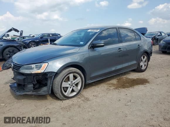 ✅ 2012 Volkswagen Jetta TDI • VIN: 3VW3L7AJ6CM067415 • Лот: 70890395. Опубликован ранее на Copart с пробегом 125 410 миль. Бесплатный доступ к архиву аукционных продаж из США и подробный отчёт об истории автомобиля на DreamBid. Изображение 1.