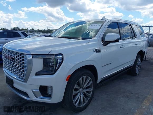 ✅ 2021 GMC Yukon Denali • VIN: 1GKS1DKL6MR226800 • Lot: 43307842. Listed on IAAI with 105,553 mi. Free auction sales archive from the USA and detailed vehicle history report at DreamBid. Image 2.