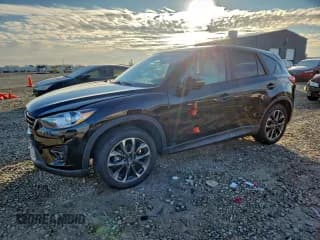 ✅ 2016 Mazda CX-5 Grand Touring • VIN: JM3KE4DY8G0776394 • Lot: 93765365. Wystawiony na Copart z przebiegiem 114 680 mil. Bezpłatny archiwum sprzedaży aukcyjnych z USA i szczegółowy raport historii pojazdu na DreamBid. Zdjęcie 1.