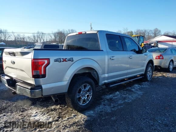 ✅ 2015 Ford F-150 XLT • VIN: 1FTEW1EG1FFC05557 • Lot: 43584157. Listed on IAAI with 218,179 mi. Free auction sales archive from the USA and detailed vehicle history report at DreamBid. Image 4.