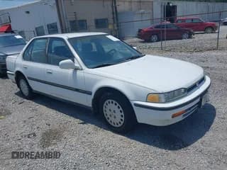 ✅ 1993 Honda Accord LX • VIN: JHMCB7653PC002464 • Lot: 42582131. Listed on IAAI with 243,918 mi. Free auction sales archive from the USA and detailed vehicle history report at DreamBid. Image 1.