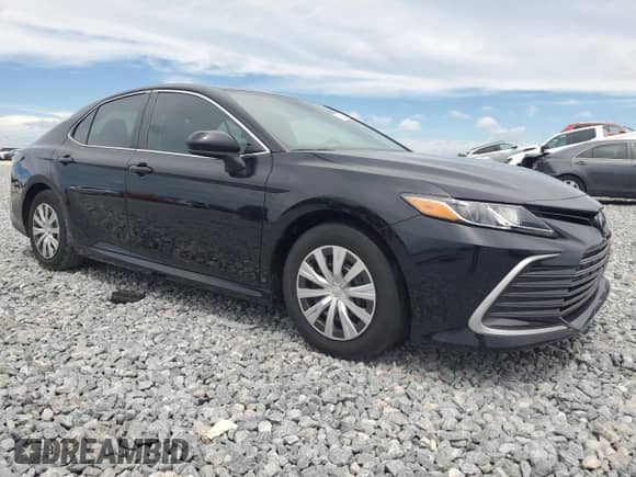 2023 Toyota Camry Hybrid LE z VIN 4T1C31AK5PU605317, wystawiony jako Copart lot #71908785 z przebiegiem Nie podano mil oraz Szkoda całkowita • Salvage title. Historia ofert i sprzedaży dostępna na DreamBid. Obrazek 4.