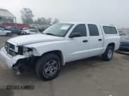 ✅ 2007 Dodge Dakota SLT • VIN: 1D7HE48K67S118009 • Лот: 43588988. Опубликован ранее на IAAI с пробегом 160 478 миль. Бесплатный доступ к архиву аукционных продаж из США и подробный отчёт об истории автомобиля на DreamBid. Изображение 2.