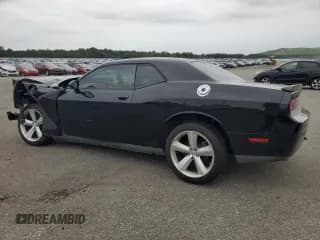 ✅ 2012 Dodge Challenger SXT Plus • VIN: 2C3CDYAG0CH206841 • Lot: 63456774. Wystawiony na Copart z przebiegiem 162 889 mil. Bezpłatny archiwum sprzedaży aukcyjnych z USA i szczegółowy raport historii pojazdu na DreamBid. Zdjęcie 2.