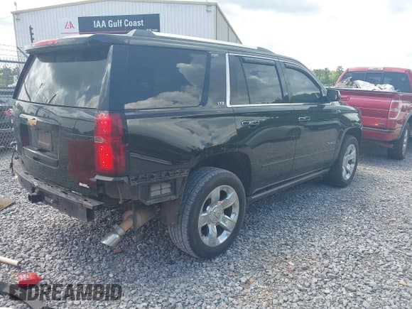 ✅ 2015 Chevrolet Tahoe LTZ • VIN: 1GNSCCKC8FR121461 • Lot: 42407901. Listed on IAAI with 137,729 mi. Free auction sales archive from the USA and detailed vehicle history report at DreamBid. Image 4.