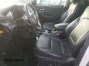 ✅ 2017 Hyundai Santa Fe Ultimate • VIN: 5XYZWDLA0HG496733 • Лот: 77305753. Опубликован ранее на Copart с пробегом 66 774 миль. Бесплатный доступ к архиву аукционных продаж из США и подробный отчёт об истории автомобиля на DreamBid. Изображение 7.