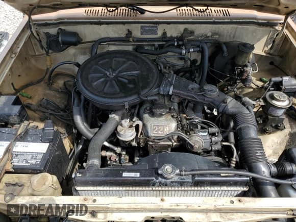 ✅ 1984 Toyota Pickup Deluxe • VIN: JT4RN56D9E0054209 • Лот: 63538665. Опубликован ранее на Copart с пробегом 197 881 миль. Бесплатный доступ к архиву аукционных продаж из США и подробный отчёт об истории автомобиля на DreamBid. Изображение 11.