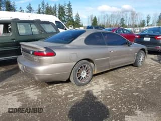 ✅ 2000 Dodge Avenger • VIN: 4B3AU42N2YE028003 • Lot: 41719063. Listed on IAAI with 184,945 mi. Free auction sales archive from the USA and detailed vehicle history report at DreamBid. Image 4.