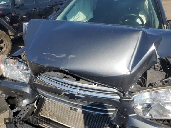 2016 Chevrolet Trax LT z VIN 3GNCJLSB6GL243665, wystawiony jako Copart lot #80991655 z przebiegiem 155 648 mil mil oraz Szkoda całkowita • Salvage title. Historia ofert i sprzedaży dostępna na DreamBid. Obrazek 12.