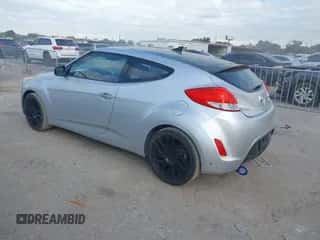 2013 Hyundai Veloster w/Black Int with VIN KMHTC6AD4DU122234, listed as a IAAI auction lot 43485517 with 118,478 mi miles and . Bid and sale history available at DreamBid. Image 3.
