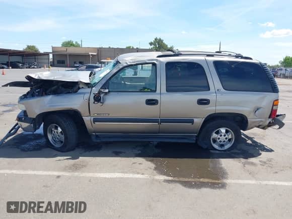 2001 Chevrolet Tahoe LT z VIN 1GNEK13T81R122136, wystawiony jako IAAI lot #42272857 z przebiegiem 216 060 mil mil oraz . Historia ofert i sprzedaży dostępna na DreamBid. Obrazek 15.
