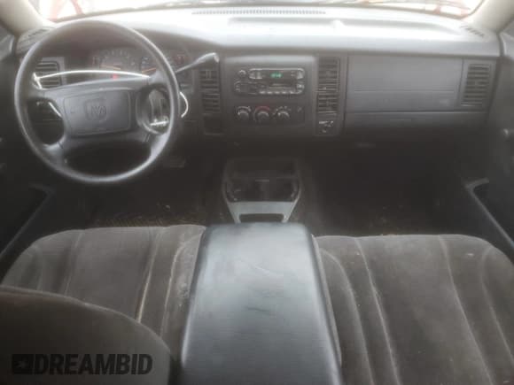 ✅ 2002 Dodge Dakota SLT • VIN: 1B7GL42XX2S504067 • Lot: 44207975. Wystawiony na Copart z przebiegiem 223 293 mil. Bezpłatny archiwum sprzedaży aukcyjnych z USA i szczegółowy raport historii pojazdu na DreamBid. Zdjęcie 8.