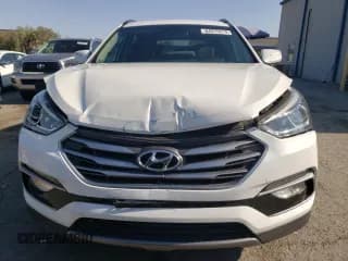 ✅ 2017 Hyundai Santa Fe 2.4L • VIN: 5NMZU3LB1HH017038 • Лот: 64975514. Опубликован ранее на Copart с пробегом 165 420 миль. Бесплатный доступ к архиву аукционных продаж из США и подробный отчёт об истории автомобиля на DreamBid. Изображение 5.