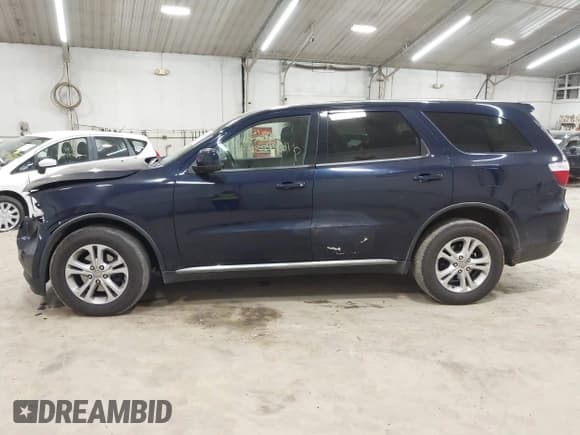 ✅ 2012 Dodge Durango SXT • VIN: 1C4RDJAG9CC164184 • Lot: 43249211. Listed on IAAI with 198,857 mi. Free auction sales archive from the USA and detailed vehicle history report at DreamBid. Image 14.