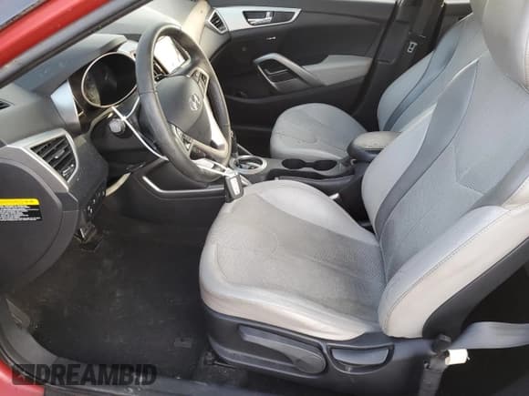 ✅ 2012 Hyundai Veloster w/Gray Int • VIN: KMHTC6AD9CU027246 • Lot: 41434385. Wystawiony na Copart z przebiegiem 98 477 mil. Bezpłatny archiwum sprzedaży aukcyjnych z USA i szczegółowy raport historii pojazdu na DreamBid. Zdjęcie 7.