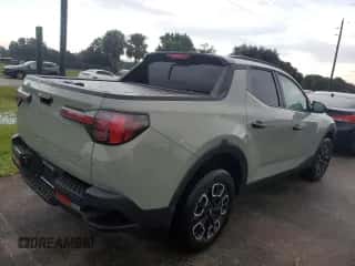 2024 Hyundai Santa Cruz SEL z VIN 5NTJC4DE3RH121602, wystawiony jako Copart lot #74307024 z przebiegiem Nie podano mil oraz Nie do naprawy • Non repairable. Historia ofert i sprzedaży dostępna na DreamBid. Obrazek 3.