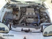 ✅ 1998 Mitsubishi 3000GT • VIN: JA3AM44H2WY000610 • Lot: 63099605. Wystawiony na Copart z przebiegiem 164 575 mil. Bezpłatny archiwum sprzedaży aukcyjnych z USA i szczegółowy raport historii pojazdu na DreamBid. Zdjęcie 11.