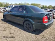 ✅ 2000 Mazda Protege ES • VIN: JM1BJ2239Y0268002 • Lot: 81656605. Listed on Copart with 233,894 mi. Free auction sales archive from the USA and detailed vehicle history report at DreamBid. Image 2.