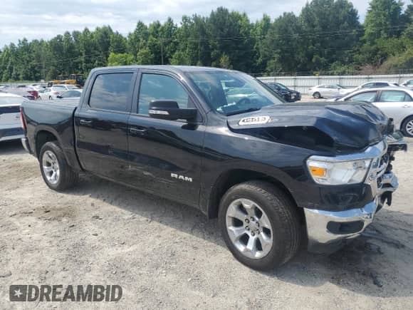 2022 Ram 1500 Lone Star with VIN 1C6SRFFT0NN427277, listed as a Copart auction lot 59408095 with 52,133 mi miles and Salvage title. Bid and sale history available at DreamBid. Image 4.