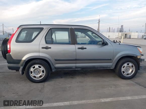 ✅ 2005 Honda CR-V LX • VIN: JHLRD68575C009057 • Lot: 43664299. Listed on IAAI with 105,984 mi. Free auction sales archive from the USA and detailed vehicle history report at DreamBid. Image 14.
