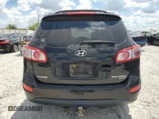 ✅ 2011 Hyundai Santa Fe SE • VIN: 5XYZHDAG9BG022031 • Lot: 69696804. Listed on Copart with 294,653 mi. Free auction sales archive from the USA and detailed vehicle history report at DreamBid. Image 6.