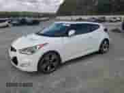 2013 Hyundai Veloster w/Gray Int z VIN KMHTC6AD6DU124843, wystawiony jako Copart lot #73250424 z przebiegiem 113 770 mil mil oraz Czysty tytuł • Clean title. Historia ofert i sprzedaży dostępna na DreamBid. Obrazek 1.
