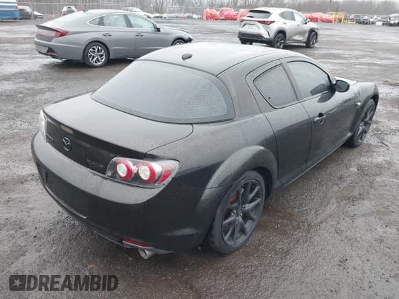 ✅ 2009 Mazda RX-8 Grand Touring • VIN: JM1FE17M590401504 • Lot: 41868698. Listed on IAAI with 74,178 mi. Free auction sales archive from the USA and detailed vehicle history report at DreamBid. Image 4.