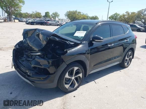 2018 Hyundai Tucson Limited with VIN KM8J33A23JU766971, listed as a IAAI auction lot 41812115 with 127,693 mi miles and . Bid and sale history available at DreamBid. Image 2.