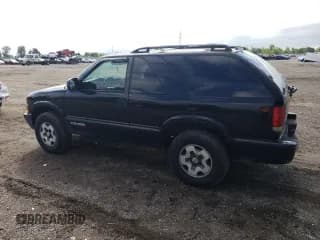 ✅ 2005 Chevrolet Blazer LS • VIN: 1GNCT18X45K112296 • Lot: 69237215. Wystawiony na Copart z przebiegiem 206 198 mil. Bezpłatny archiwum sprzedaży aukcyjnych z USA i szczegółowy raport historii pojazdu na DreamBid. Zdjęcie 2.