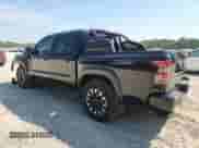 2023 Nissan Frontier Pro-X with VIN 1N6ED1EJ8PN643997, listed as a Copart auction lot 80469165 with 24,704 mi miles and Salvage title. Bid and sale history available at DreamBid. Image 2.