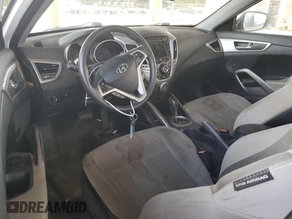 ✅ 2013 Hyundai Veloster w/Gray Int • VIN: KMHTC6AD0DU148961 • Lot: 69936434. Wystawiony na Copart z przebiegiem 135 371 mil. Bezpłatny archiwum sprzedaży aukcyjnych z USA i szczegółowy raport historii pojazdu na DreamBid. Zdjęcie 8.