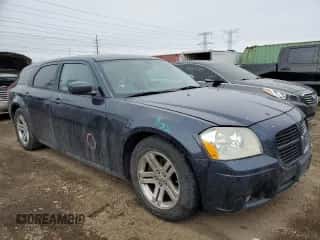 2006 Dodge Magnum R/T с VIN 2D4GV57276H122690, выставлен на аукционе Copart как лот 44357495 с пробегом 129 569 миль миль и Списание • Salvage title. История ставок и продаж доступна на DreamBid. Изображение 4.