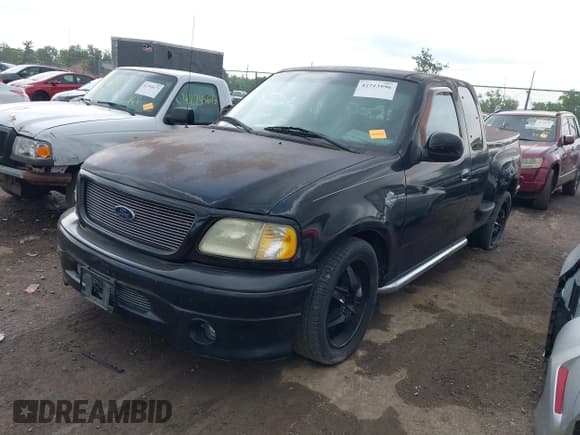 ✅ 2000 Ford F-150 XL • VIN: 2FTRX07L3YCB03694 • Lot: 42713596. Listed on IAAI with Not provided. Free auction sales archive from the USA and detailed vehicle history report at DreamBid. Image 2.