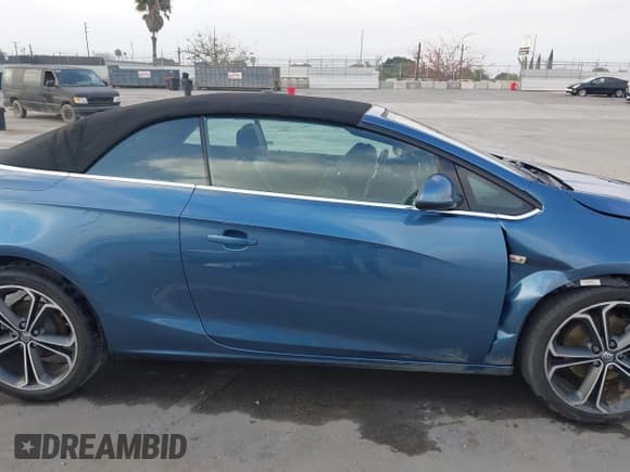 ✅ 2016 Buick Cascada • VIN: W04WV3N55GG038076 • Lot: 42078862. Wystawiony na IAAI z przebiegiem 93 971 mil. Bezpłatny archiwum sprzedaży aukcyjnych z USA i szczegółowy raport historii pojazdu na DreamBid. Zdjęcie 14.