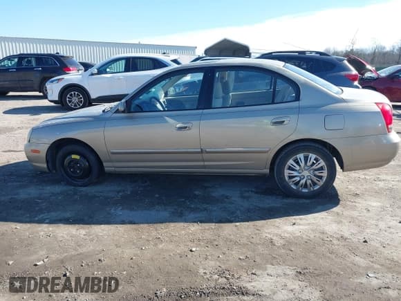 ✅ 2003 Hyundai Elantra GLS • VIN: KMHDN45D33U595053 • Lot: 41417029. Wystawiony na IAAI z przebiegiem 146 636 mil. Bezpłatny archiwum sprzedaży aukcyjnych z USA i szczegółowy raport historii pojazdu na DreamBid. Zdjęcie 14.
