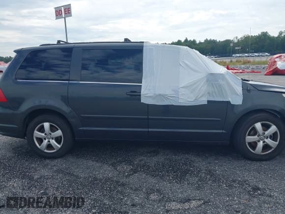 ✅ 2011 Volkswagen Routan SEL • VIN: 2V4RW5DG0BR658555 • Лот: 37864301. Опубликован ранее на IAAI с пробегом 98 227 миль. Бесплатный доступ к архиву аукционных продаж из США и подробный отчёт об истории автомобиля на DreamBid. Изображение 13.