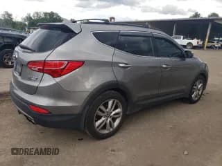 ✅ 2015 Hyundai Santa Fe • VIN: 5XYZWDLA5FG276274 • Лот: 68536874. Опубликован ранее на Copart с пробегом Не указан. Бесплатный доступ к архиву аукционных продаж из США и подробный отчёт об истории автомобиля на DreamBid. Изображение 3.