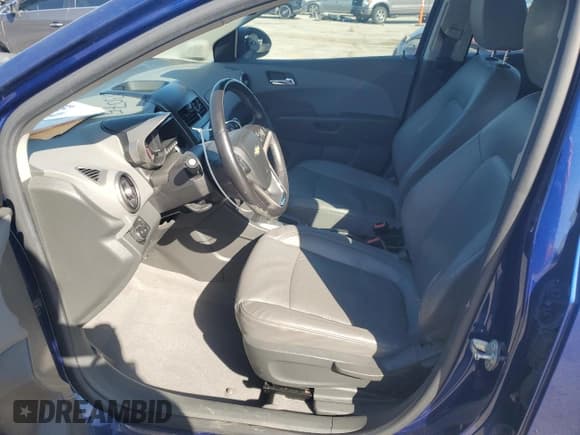 ✅ 2012 Chevrolet Sonic LTZ • VIN: 1G1JE6SH2C4211444 • Lot: 54013075. Listed on Copart with 97,378 mi. Free auction sales archive from the USA and detailed vehicle history report at DreamBid. Image 7.