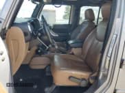 ✅ 2014 Jeep Wrangler Unlimited Sahara • VIN: 1C4BJWEG9EL108847 • Lot: 70563165. Wystawiony na Copart z przebiegiem 172 316 mil. Bezpłatny archiwum sprzedaży aukcyjnych z USA i szczegółowy raport historii pojazdu na DreamBid. Zdjęcie 7.