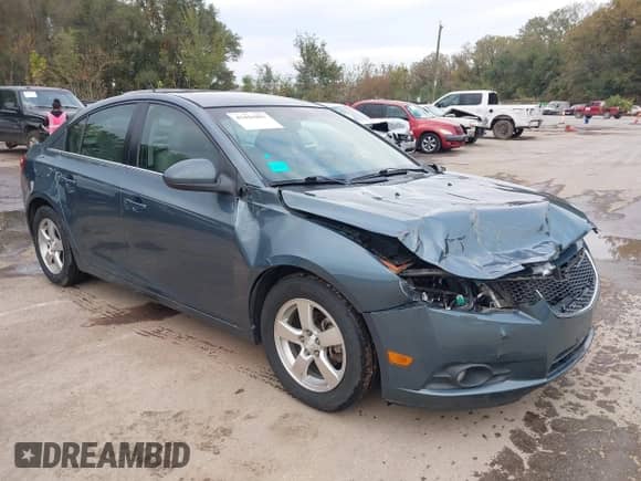 2012 Chevrolet Cruze 1LT z VIN 1G1PF5SC5C7240568, wystawiony jako IAAI lot #43441891 z przebiegiem 100 950 mil mil oraz . Historia ofert i sprzedaży dostępna na DreamBid. Obrazek 1.