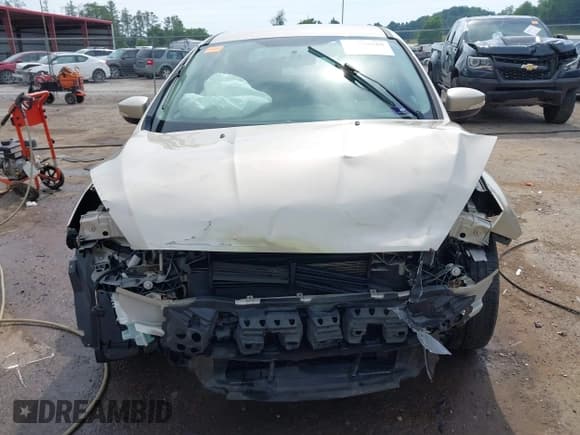 ✅ 2017 Ford Focus SE • VIN: 1FADP3F20HL237823 • Lot: 39690628. Listed on IAAI with 104,747 mi. Free auction sales archive from the USA and detailed vehicle history report at DreamBid. Image 13.