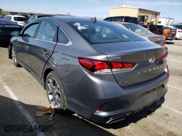 ✅ 2018 Hyundai Sonata Limited Plus • VIN: 5NPE34AB7JH667785 • Лот: 43824853. Опубликован ранее на Copart с пробегом 65 099 миль. Бесплатный доступ к архиву аукционных продаж из США и подробный отчёт об истории автомобиля на DreamBid. Изображение 2.